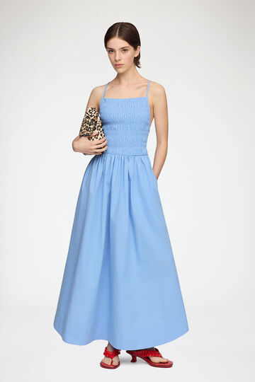 Model wearing long blue dress