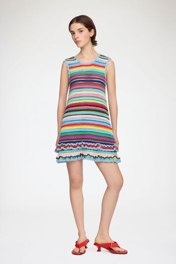 Model wearing short printed crochet dress